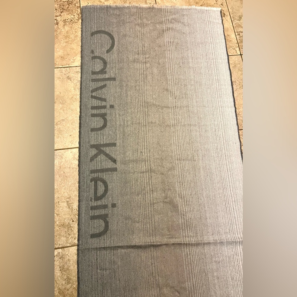 New w/Tags. CALVIN KLEIN 74" long Scarf/Wrap. Heathered Taupe/Gray Striped.